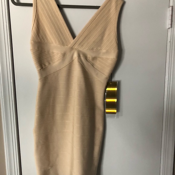 Dresses & Skirts - Tan bandage dress never worn